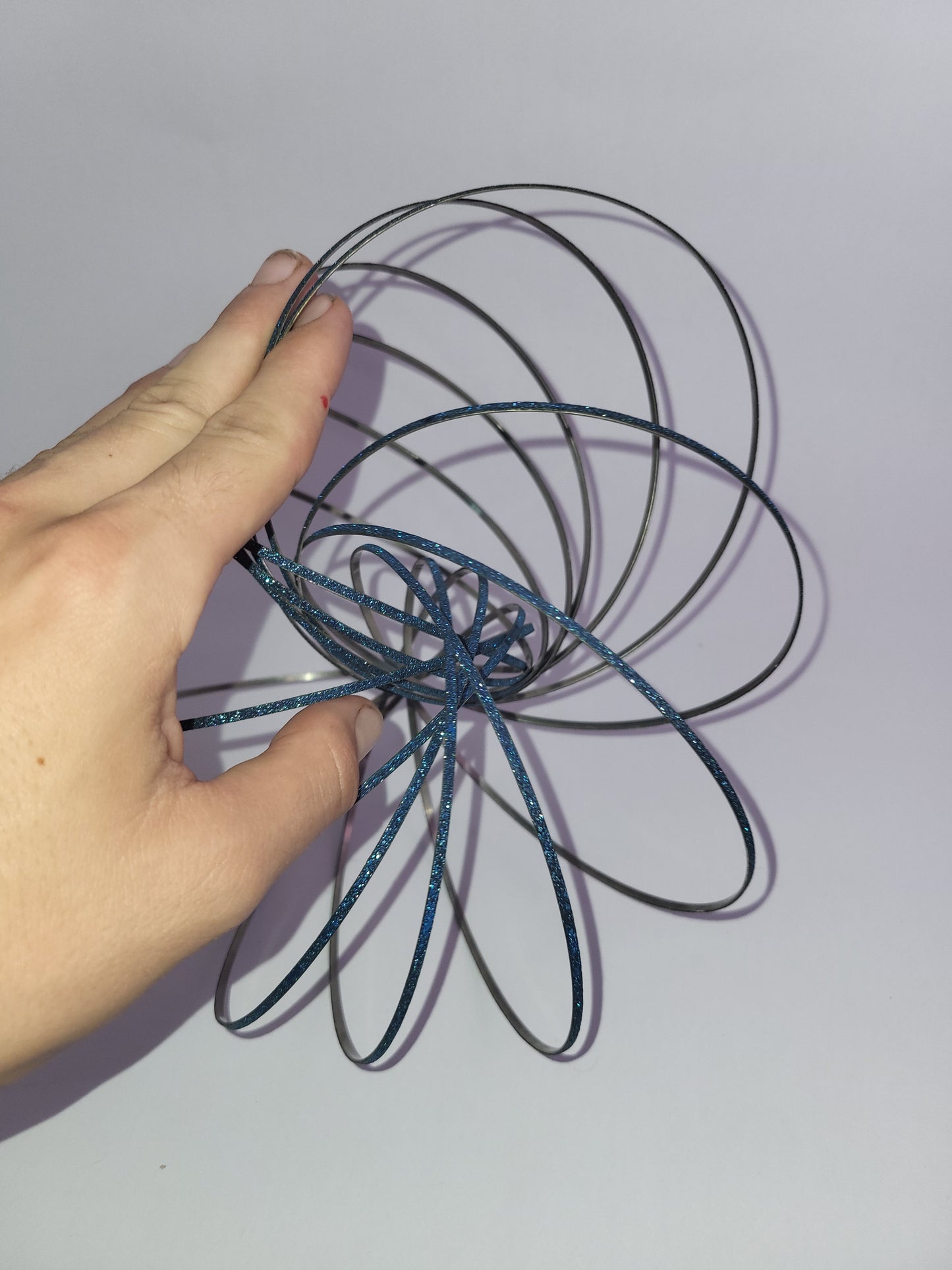 Magic Flow Ring Kinetic Spring Toy – Blue