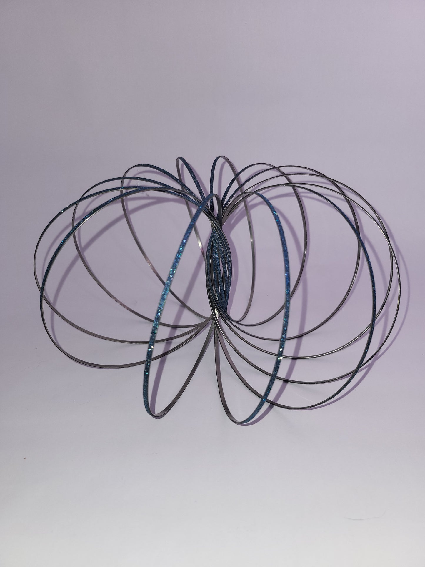Magic Flow Ring Kinetic Spring Toy – Blue